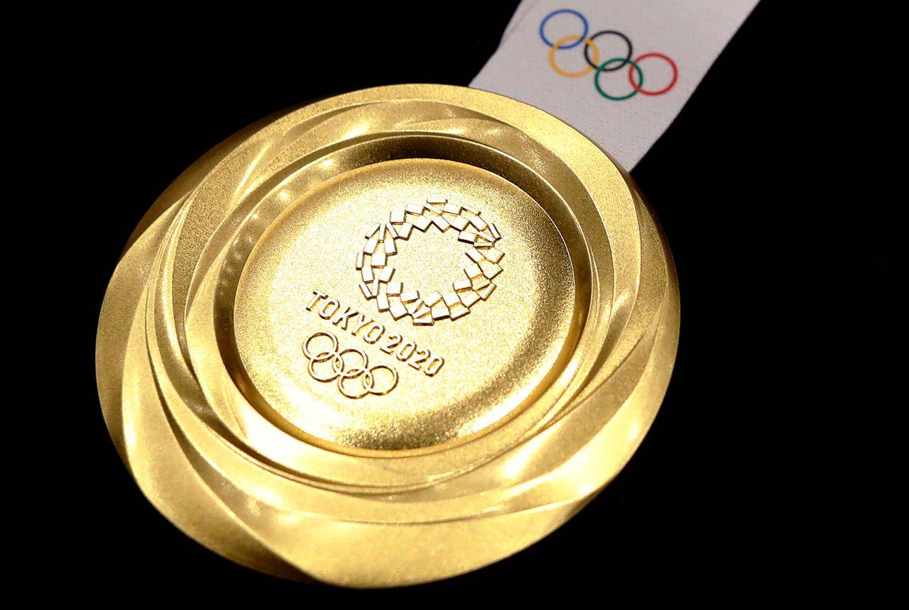 此次的奖牌是奥运会史上首次使用从废旧手机等小型家电设备中提炼的的